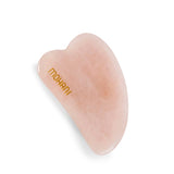 Gua Sha face massage plate made of rose quartz